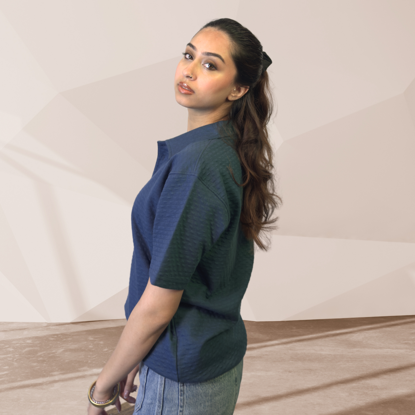 WOMEN'S BLUE KNITTED POLO